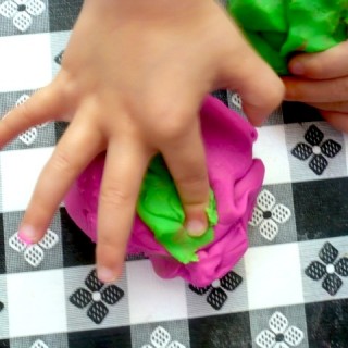 Another thing she's been doing is putting "Band-Aids" on her Play-Doh.