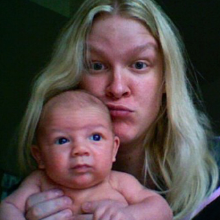 Megan and Caleb in the dark newborn days