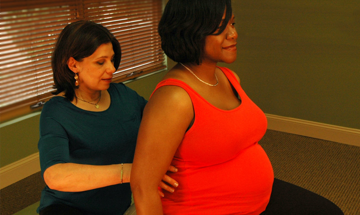 Debra working on a patient