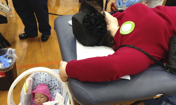 The baby looks peaceful here but it is screaming its little plastic head off