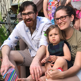 Ellen with her boyfriend Tim and their daughter Fiona, also pictured above