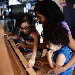 TV personality Timberly Whitfield with her children Raina and Gabriel